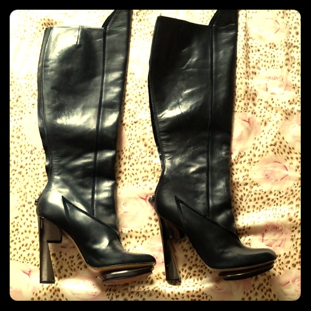 Knee high black leather boots